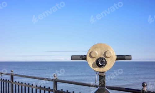 Preview: Viewing scope at a viewpoint facing the sea, selective focus.