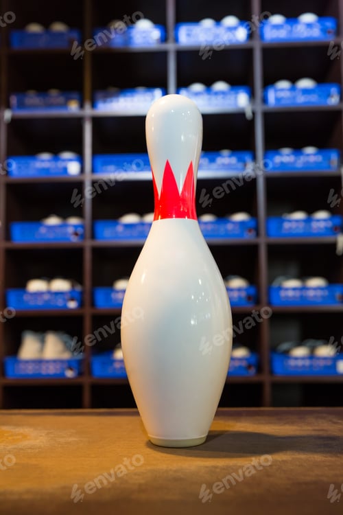 Preview: Bowling shoes and pins