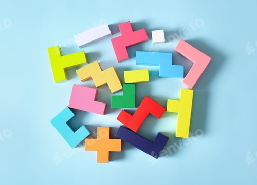 Preview: Multicolored puzzle, cubes on a blue background