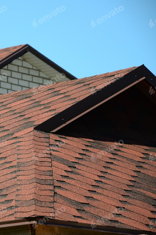Preview: The roof is covered with bituminous shingles of brown color. Quality Roofing