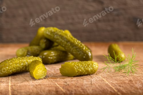 Preview: Pickles on Wooden Board with Dill Sprig