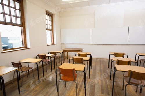 Preview: Empty Classroom With Empty Chairs And Desks
