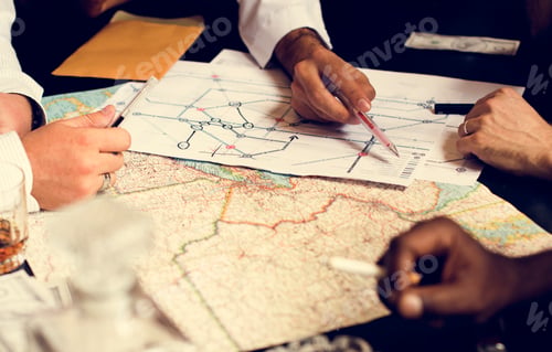 Preview: Group of people planning with the map