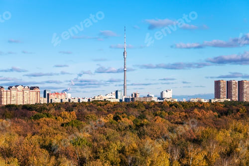 Preview: autumn landscape with woods and city with tv tower