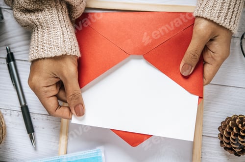 Preview: Hands holding Opened Notebook. Blank cover Mock-up.