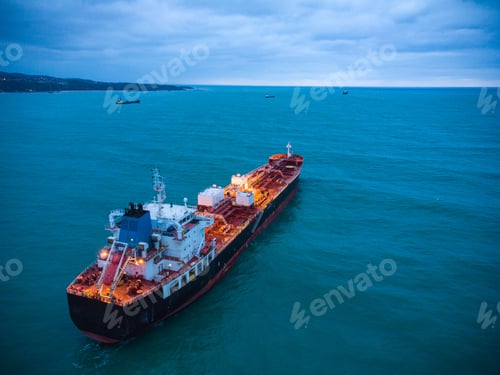 Preview: Aerial view oil ship tanker carrier oil on the sea at sunrise