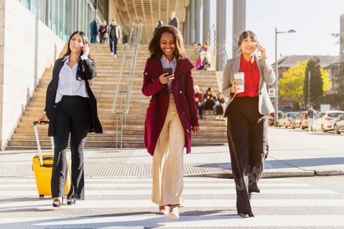 Preview: multiracial group of three business women