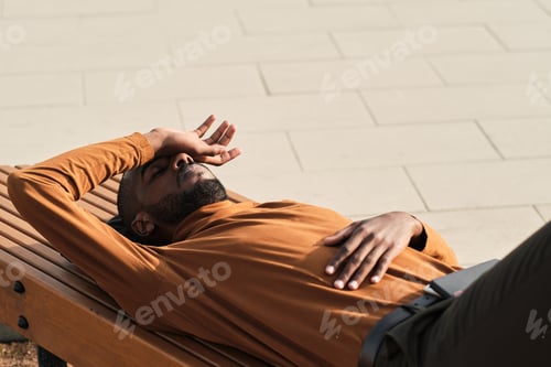 Preview: Tired Man Having Rest Outdoors