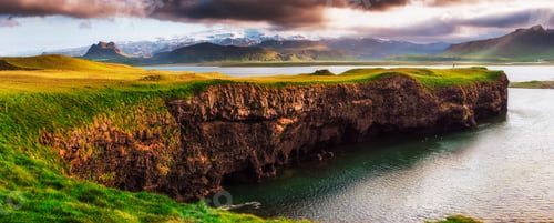 Preview: Reynisfjara black sand beach in Iceland. Reynisfyal Mountains.