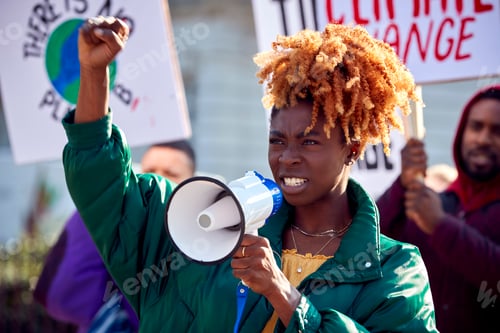 Preview: Group Of Protestors With Placards And Megaphone On Demonstration March Against Climate Change
