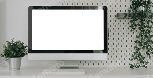 Preview: Mockup blank screen laptop on desk. Workspace with laptop and office supplies.