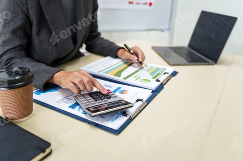 Preview: Businesswoman in a grey suit works from home, specializing in policy and planning analysis