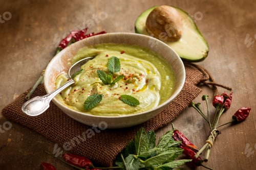 Preview: avocado soup with mint leaf and hot chili pepper