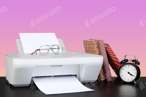 Preview: Compact home laser printer against pink background