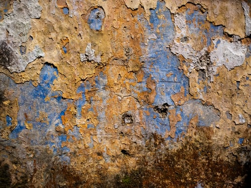 Preview: Sun-Drenched Textures and Peeling Paint Reveal the Passage of Time on a Weathered Wall