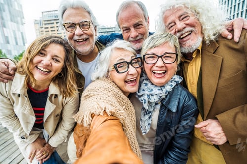 Preview: Happy senior people taking selfie picture with smart mobile phone device outside