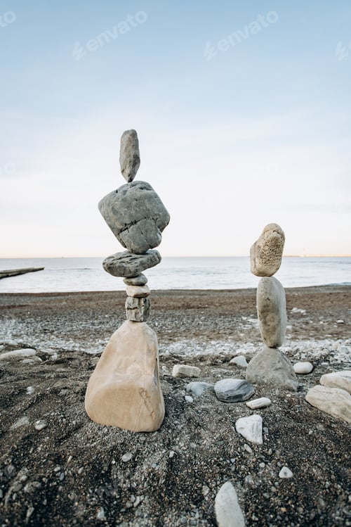 Preview: Figures of stones on the beach. Beautiful figures of stones on the background of the sea.