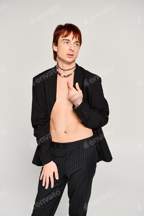 Preview: Suited elegance: a modern man strikes a pose