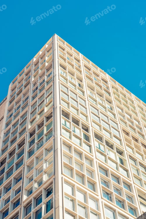 Preview: Modern high-rise office building against a clear blue sky in Marseille, France