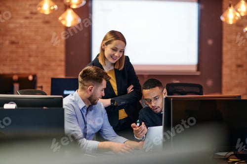 Preview: Strategic Business Meeting: Group of Professionals Collaborating in Office Using Computers