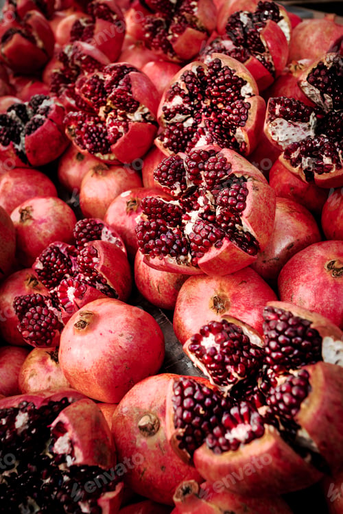 Preview: Cracked pomegranate. Ripe pomegranate close-up