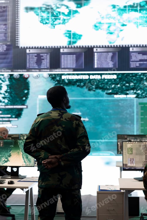 Preview: Infantry unit recruit analyzing important battlefield data on big screen