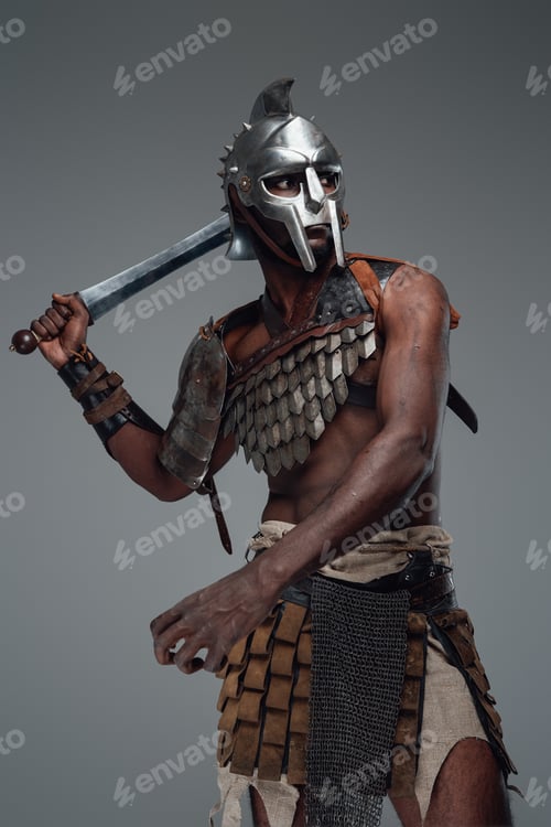 Preview: Isolated in grey background african gladiator with sword