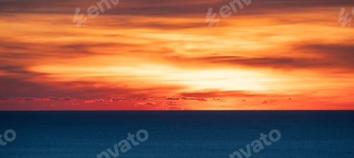 Preview: Dramatic Colorful Sunset Sky over Mediterranean Sea. Cloudscape Nature Background