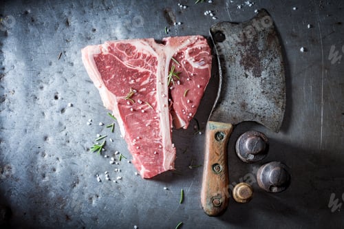 Preview: Bloody red steak with salt and rosemary