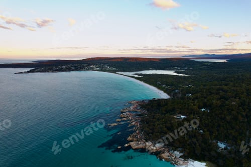 Preview: Swimcart beach at sunset with Binalong Bay Town, Tasmania