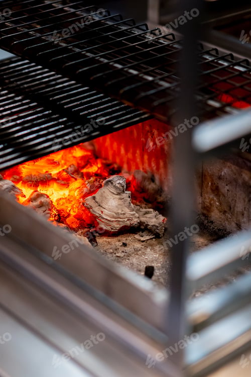 Preview: close-up in Japanese restaurant compact tabletop grill for cooking food high temperature coals