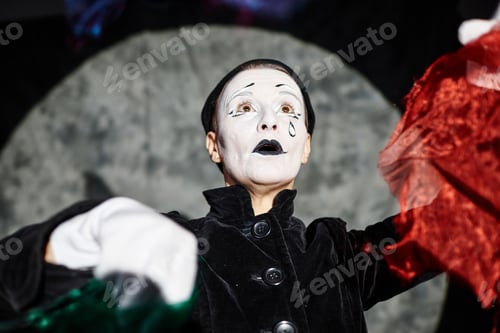 Preview: Mime Performing on Stage with Props