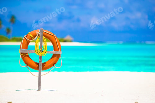 Preview: Lifebuoy ring on tropical white beach
