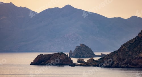 Preview: Rocky Coast on the Mediterranean Sea during a cloudy sunset. Cartagena, Spain.