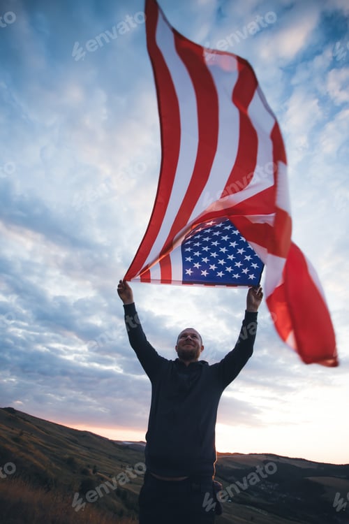 Preview: Man with waving USA flag.
