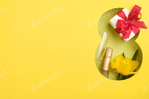 Preview: 8 March greeting card. Paper cut Eight made of yellow background and fresh spring flowers bouquet of