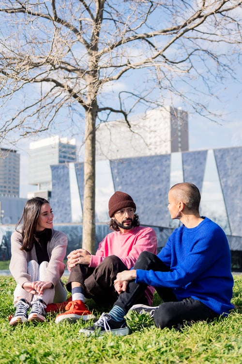 Preview: three friends enjoying in a sunny day at the park