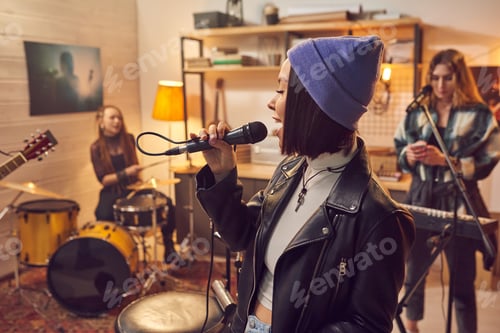 Preview: Stylish female singing in microphone