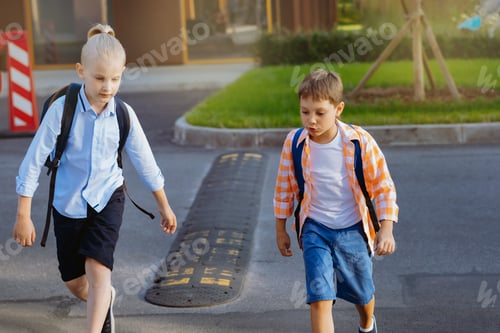 Preview: children walking to school crossing road in illegal place. Begining of academic year