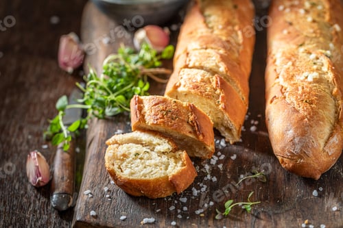 Preview: Homemade garlic bread with salt. Baguette with garlic.