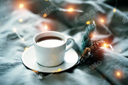 Preview: A cup of cocoa in a bed with lights