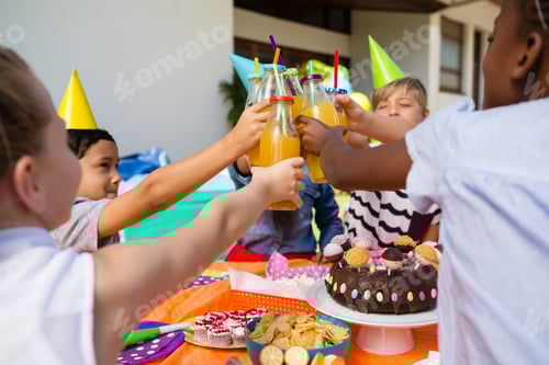Preview: Children toasting juice