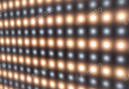 Preview: Defocused close-up of panel with bright luminous LEDs