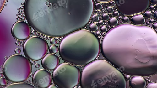 Preview: Abstract Colorful Food Oil Drops Bubbles and spheres Flowing on Water Surface