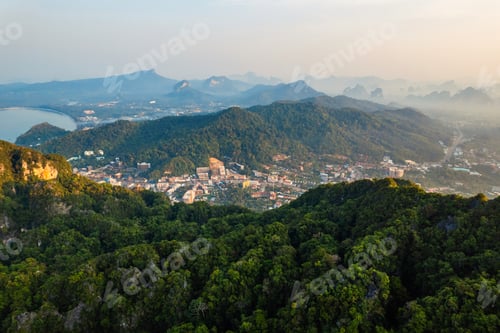 Preview: summer view of rocky mountains and sea in a tropical morning