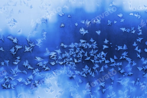 Preview: Beautiful ice pattern on winter window glass