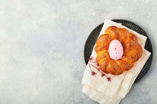 Preview: Spanish Easter cake. Traditional mona de pascua typical in Spain with boiled eggs eaten inside on li