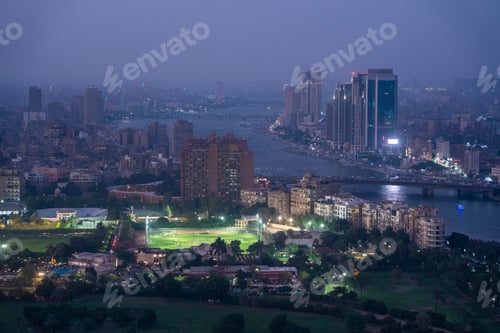 Preview: Egypt, Cairo, Aerial view of cityscape and Nile river at night
