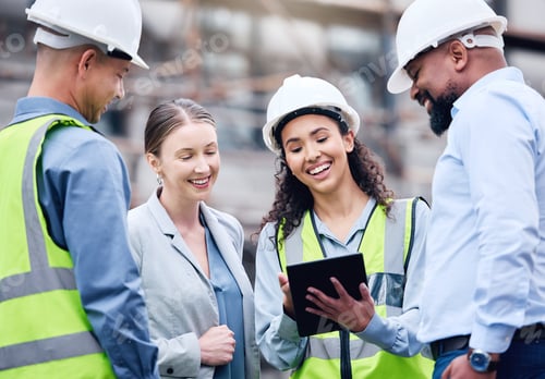 Preview: Shot of a group of architects using a digital tablet at a building site