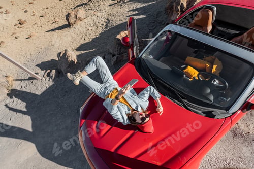 Preview: Carefree woman traveling by car